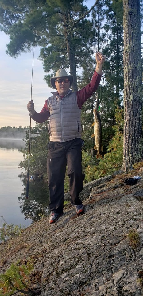 Catching a northern pike in the Quetico Provencial Park