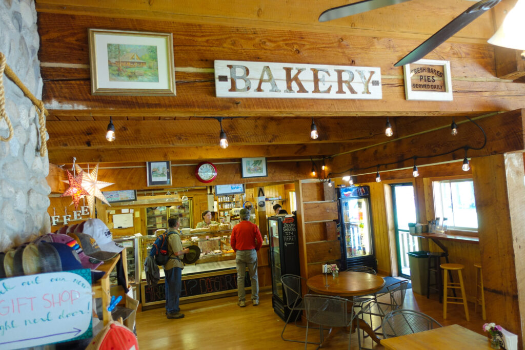 "Hikers intside the Stehekin Pastry Company purchasing baked goods after hiking the Lakeshore Trail"