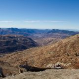 You can see the Hummocks Trailhead parking lot from here if you look really hard for it