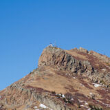 Coldwater Peak. If you have ever climbed Mt Saint Helens or maybe even walked around it on the Loowit Trail, you might see something reflecting off off one of the peaks in the Mt Margaret vicinity. It appears it is some kind of monitoring equipment on top of Coldwater peak as seen in this photo.